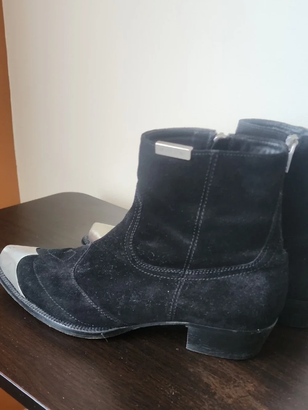 Represent black suede